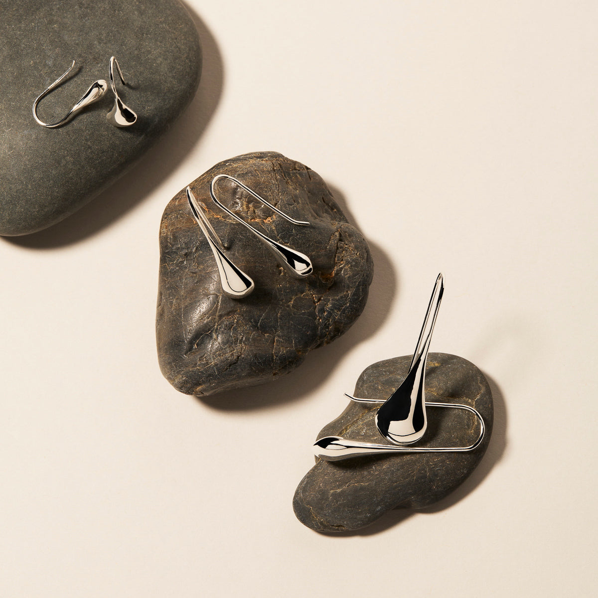 Sterling Silver Najo 8 x 18mm teardrop earrings.